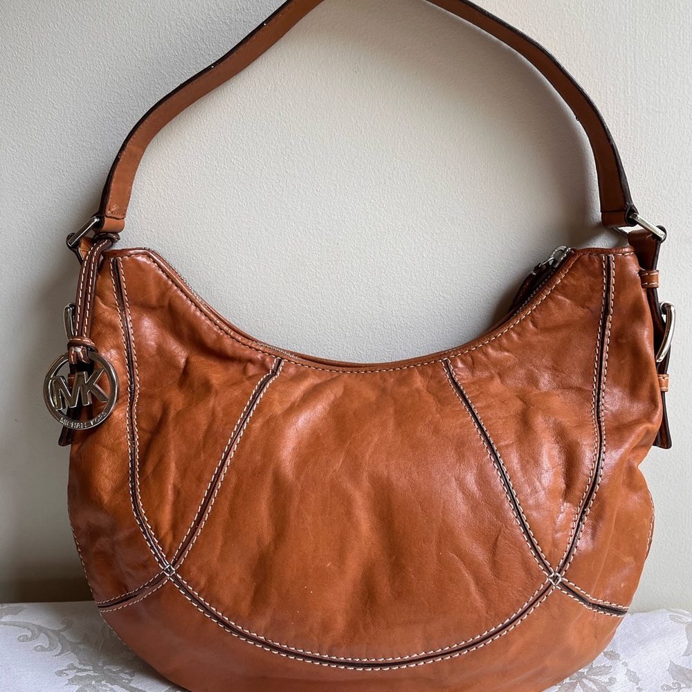 Michael Kors hobo bag, cognac with silver hardware.Michael Kors